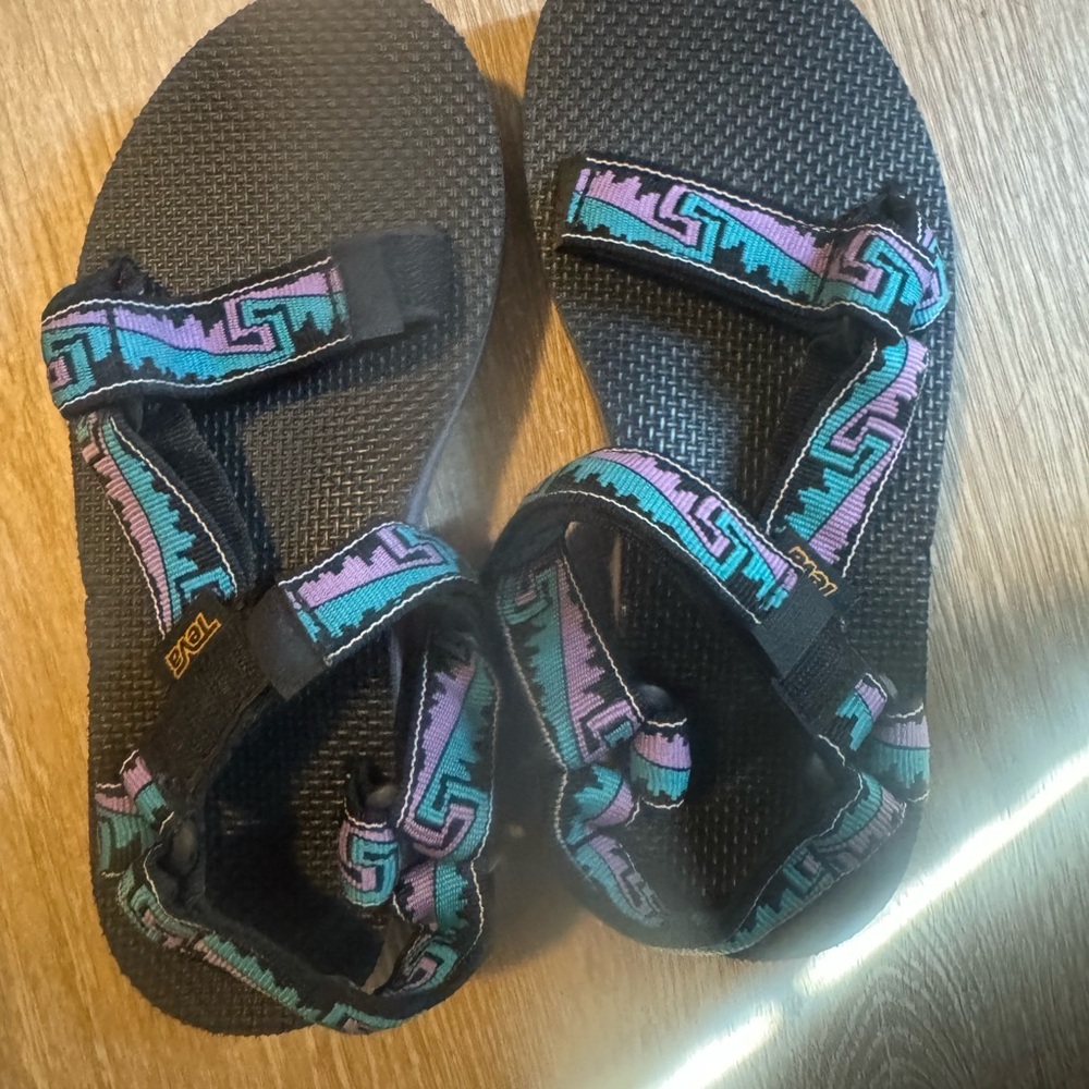 Teva women’s Black and Teal Sandals